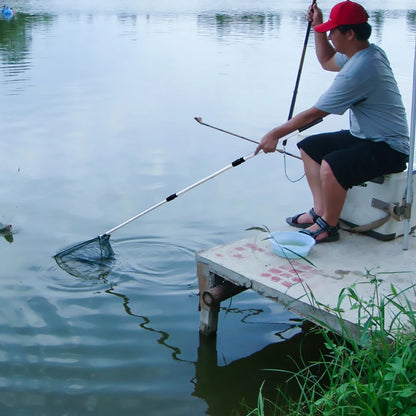 Telescopic collapsible floating fishing net